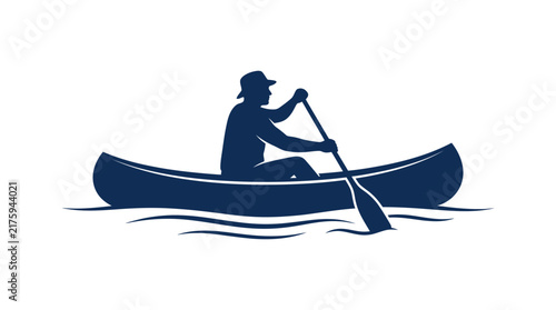 Silhouette of a man in a hat rowing a canoe on water