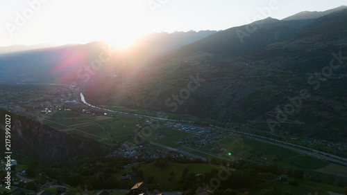 Canvas Print Aerial drone landscape of Ergisch alpine village in Switzerland, featuring the i