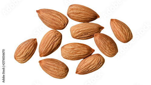Scattered raw almonds with textured brown shells, isolated on transparent background