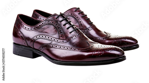 Photography Polished burgundy leather wingtip brogue dress shoes detailed with perforations,