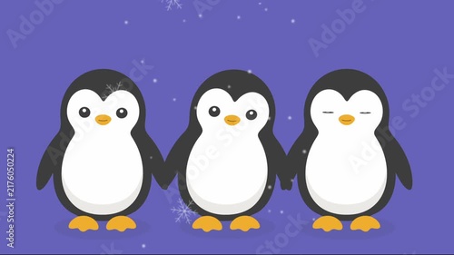 adorable baby penguin dance in winter snowfall