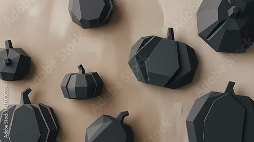 Minimalist Scandinavian background with 3D faceted charcoal geometric pumpkins in top view