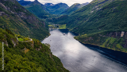 Принти на полотні Aerial view of Geirangerfjord with cruise ships, forested mountains and settleme
