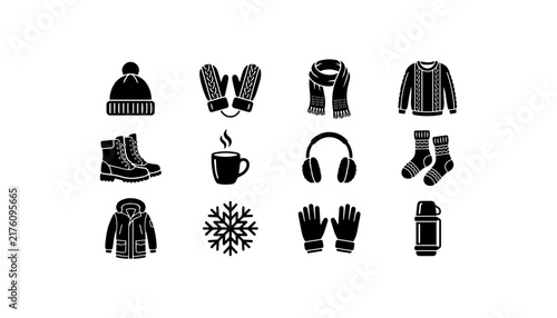 winter clothes knitted hat mittens boots jacket thermos and socks