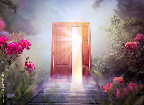 Fantasy enchanted fairy tale forest with opening secret wooden door and stairs leading to mystical divine shine light outside the gate, whimsy fairytale magic rose flower garden in whimsical woods.