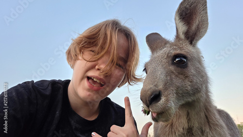 Teen Taking Selfie Portrait with Kangaroo Outdoors