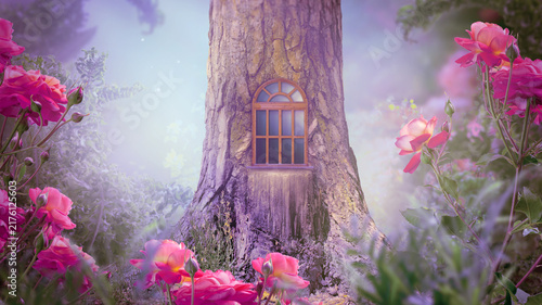Whimsical fantasy elf or gnome house in pine tree with window, whimsy enchanted fairy tale forest with fabulous fairytale blooming rose flower garden in misty morning, mystical foggy nature landscape.