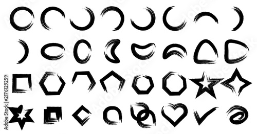 Set of handdrawn brush stroke geometric shapes and symbols isolated on white background
