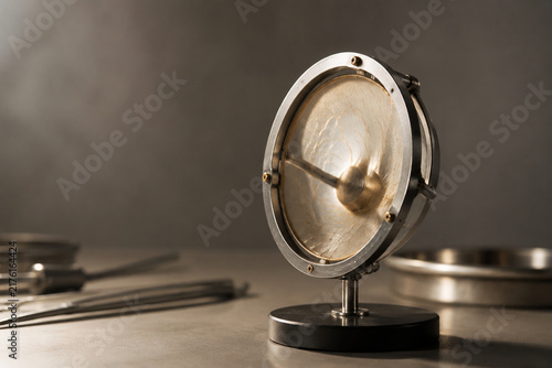 Fototapeta kuchenna Delicate acoustic eardrum model with biomimetic membrane and metallic frame, hearing science concept