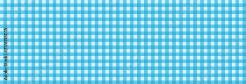Seamless pattern with traditional light blue and white checkered pattern. Geometric tartan ornament shows a perfectly aligned repeating grid texture with intersecting shades of blue and teal squares. 