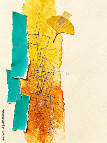 Abstract handmade collage features golden watercolor paper, turquoise torn pieces, ink scribbles, and a delicate dried ginkgo leaf.