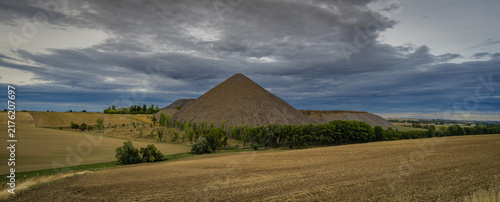 Bild auf Leinwand The distinctive slag heap of the Brosowski shaft in Mansfelder Land under a wide