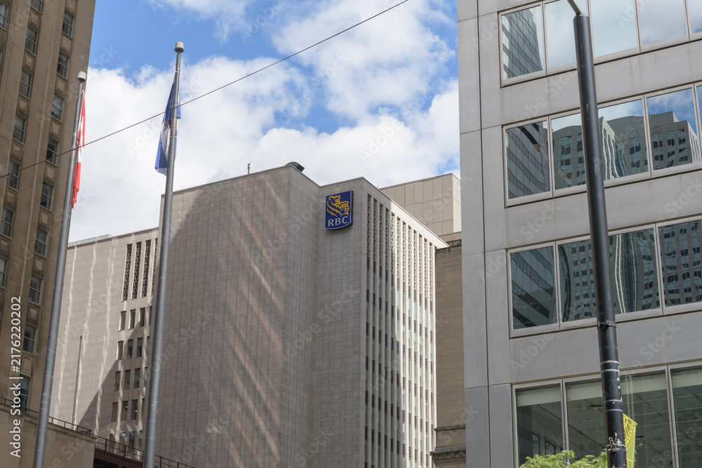 Obraz premium RBC corporate logo sign on the exterior of 20 King St W, a mid-century modern office building designed by Marani, Morris & Allen, Toronto