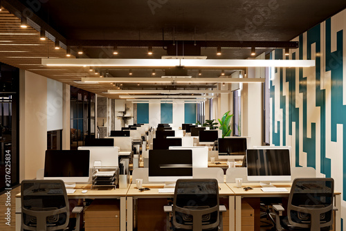 Modern Luxury Office Interior Design with Open Workspace and Geometric Accent WalL