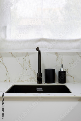 Принти на полотні Modern Kitchen Detail with Matte Black Faucet Undermount Sink and White Marble B