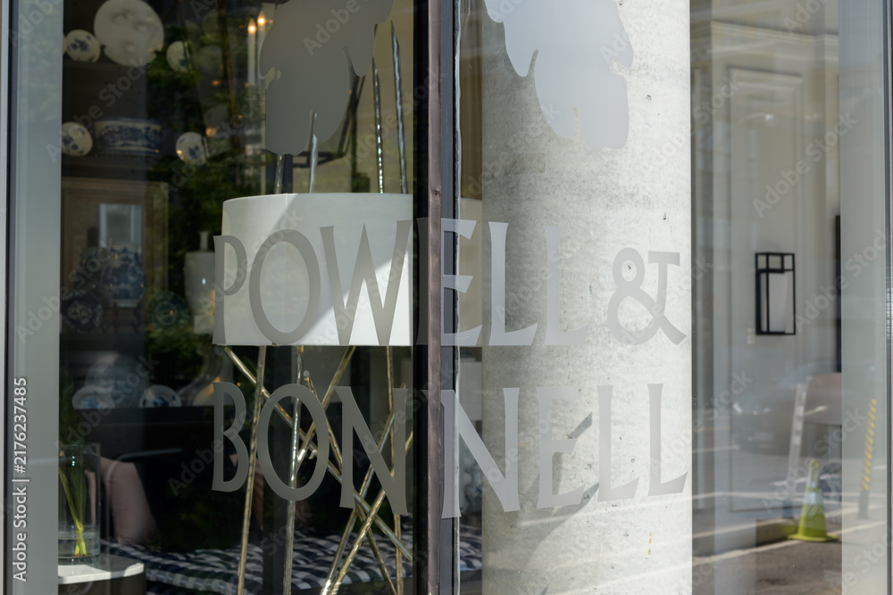 Obraz premium exterior building display window and sign of Powell & Bonnell, a furniture, lighting, and textiles shop, located at 236 Davenport Rd, Toronto
