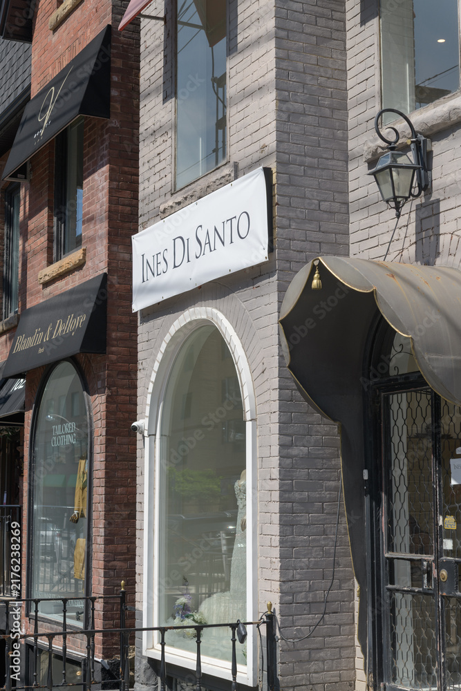 Obraz premium exterior building facade and sign of Ines Di Santo, a bridal shop, at their temporary location, 180 Davenport Rd, Toronto