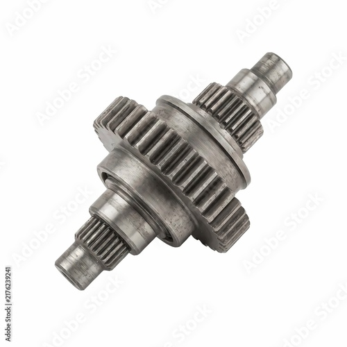 Shiny metal gear assembly featuring intricate teeth and a smooth cylindrical shaft isolated on a clean bright white studio background