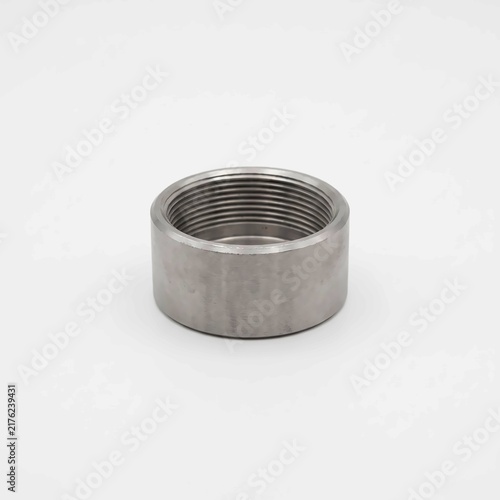 Metallic threaded pipe cap connector featuring internal threads and a polished silver steel surface isolated on a clean white background