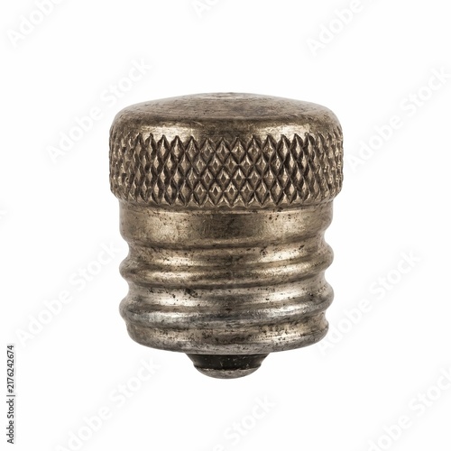 Industrial metal valve cap featuring detailed knurled texture and weathered finish isolated against a clean white professional studio background surface