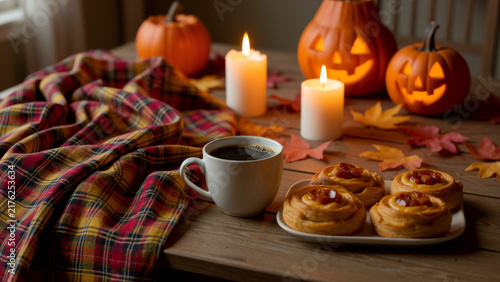 Candlelit autumn table filled with seasonal dishes pumpkins and warm rustic decor creating a cozy harvest feast atmosphere for family gatherings festive dining and fall celebrations