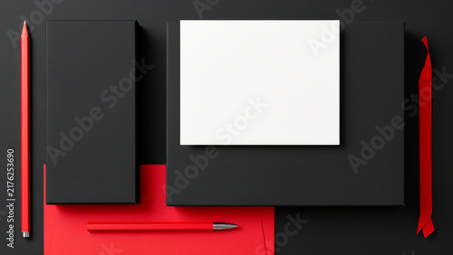 Modern black and red presentation stage with geometric platforms and a blank illuminated screen providing a dramatic product showcase setting for launches events branding and advertising