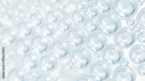 Soft blue field of transparent water bubbles and circular droplets creating a clean refreshing abstract texture associated with hydration freshness purity fluid motion and cool atmosphere