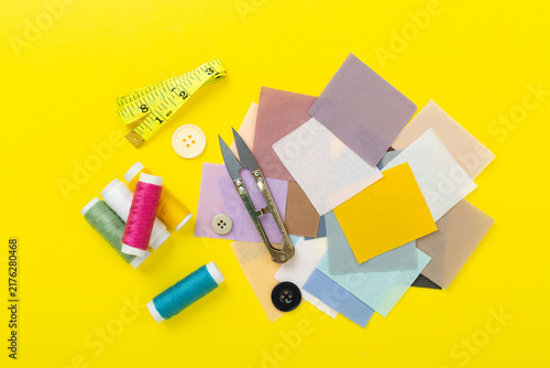 Photography Sewing and needlework accessories on color background, top view