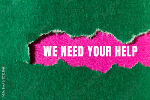 Quadro su tela We need your help message written on ripped torn paper background