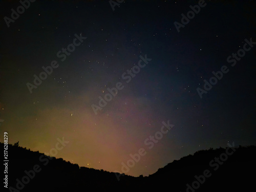 Starry Night Sky Background with Faint Meteor Trails and Deep Space Stars
