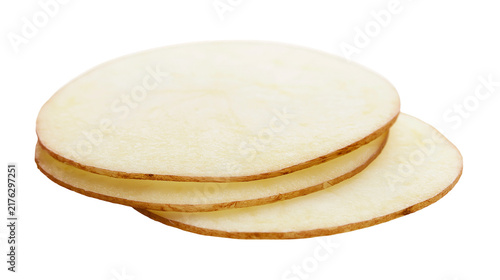 Принти на полотні Three thin round slices of raw potato with light yellow flesh and brown skin