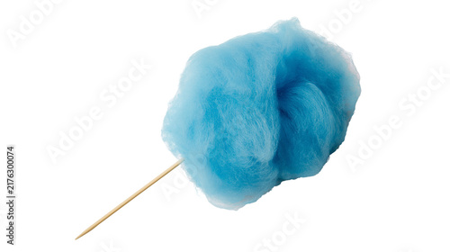 Fotografie Fluffy blue cotton candy on a wooden stick