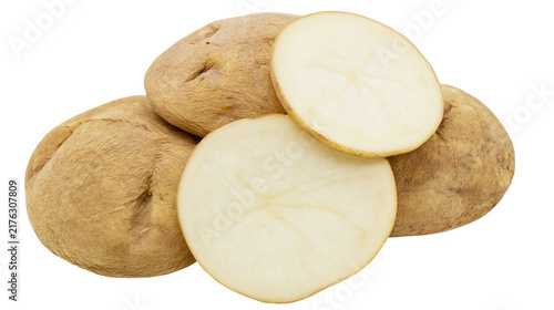 Bild auf Leinwand Whole and sliced raw brown potatoes with creamy white flesh