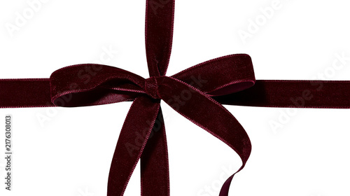 Obraz na plátně Deep burgundy velvet ribbon tied in a decorative bow with long flowing ends