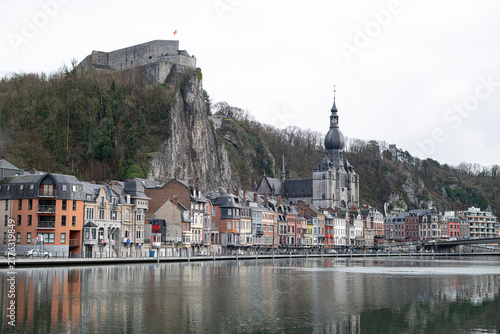 Fotografie Dinant, Belgium, January 2, 2026: Dinant city along meuse river with citadel and
