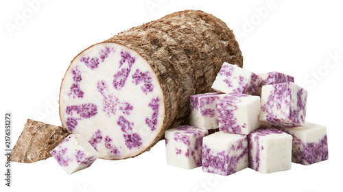 Bild auf Leinwand Whole and cubed purple yam root with textured brown skin and white flesh