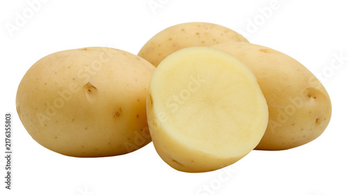 Foto Fresh whole and halved yellow potatoes with smooth skin