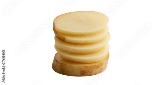 Foto Stacked round slices of raw peeled potato with brown skin edges