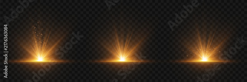 Golden light burst effects with luminous beams and sparkling particles