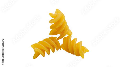 Quadro su tela Three yellow dry fusilli pasta spirals arranged in a cluster