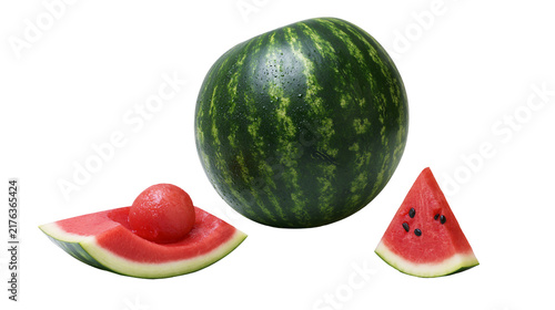 Whole round watermelon with a carved wedge and a fresh red fruit scoop