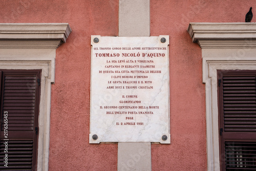 Commemorative plaque to poet and scholar Tommaso Nicolo d'Aquino in Via Tommaso d'Aquino, historic center of Taranto, Puglia, Italy