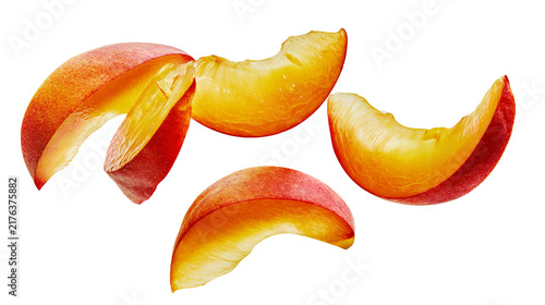Fresh ripe nectarine fruit slices with orange flesh and red skin