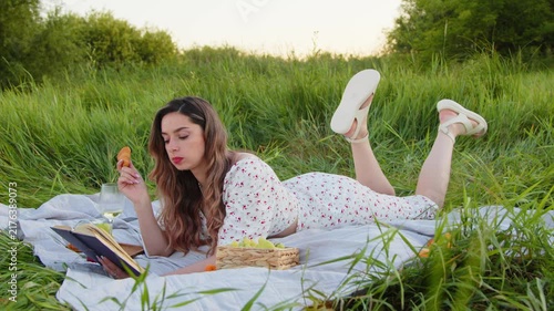 Enjoy a sunny outdoor picnic with a good book and tasty snacks in nature