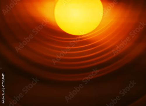 Abstract warm light coming from the electrical bulb background