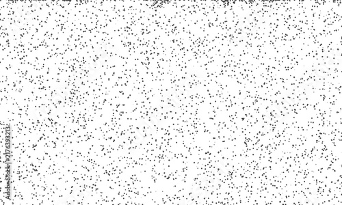 Abstract monochrome grain texture with black speckled noise pattern on a white background for modern graphic design and digital art