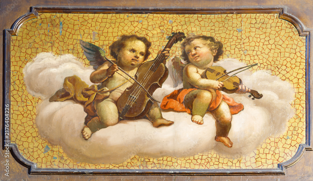 Fototapeta premium VERCELLI, ITALY - JANUARY 17, 2026: The painting of angels with the music instruments in the church Chiesa di Sant' Agnese in San Francesco by unknown artist