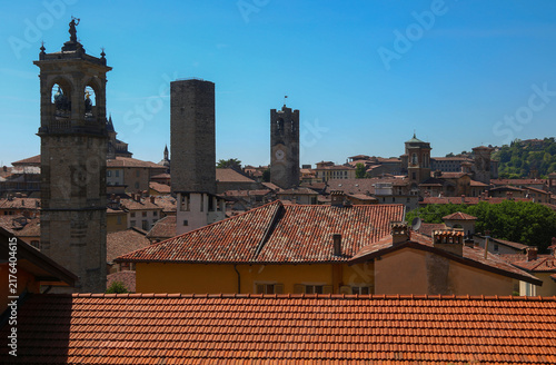 Quadro su tela Panoramic view of medieval towers and tiled roofs in Bergamo upper city Lombardy