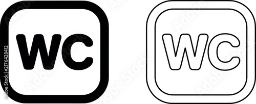 Minimalist black and white WC toilet icons for public facility signage providing clear functional wayfinding in a studio setting.