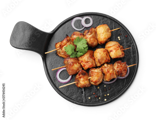 Fotografie Delicious shish kebabs with spices isolated on white, top view